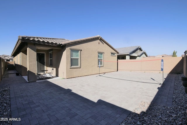 4149 E Appaloosa Rd, Gilbert, AZ 85296 - back of property featuring a fenced backyard, a tile roof, stucco siding, and a patio area