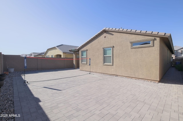 4149 E Appaloosa Rd, Gilbert, AZ 85296 - back of property with a fenced backyard, stucco siding, and a patio