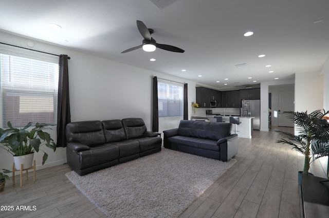 4149 E Appaloosa Rd, Gilbert, AZ 85296 - living room with baseboards, light wood-style flooring, ceiling fan, and recessed lighting