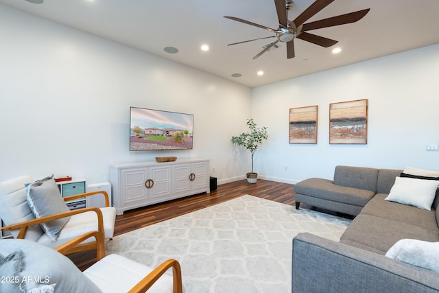 living area with ceiling fan, dark wood-type flooring, baseboards, and recessed lighting