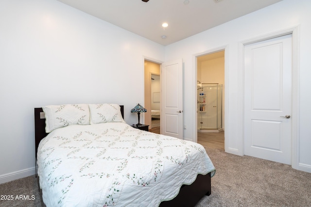 bedroom featuring carpet flooring, connected bathroom, and baseboards