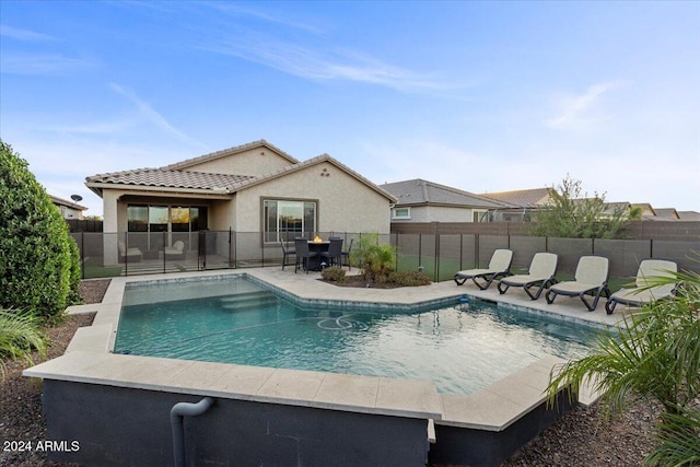 view of pool featuring a patio area