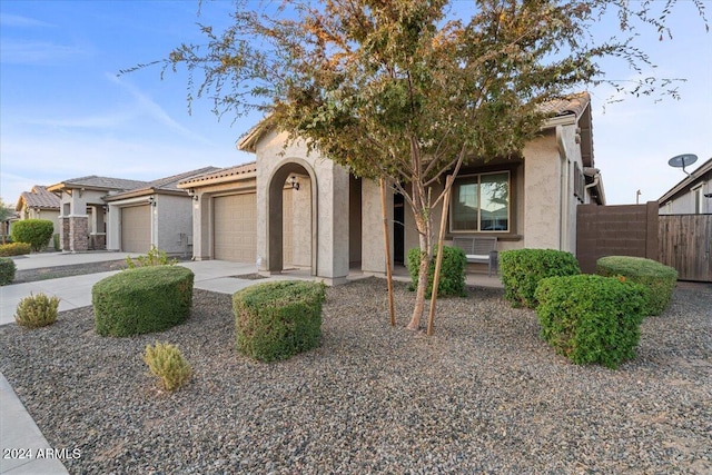 view of front of home with a garage