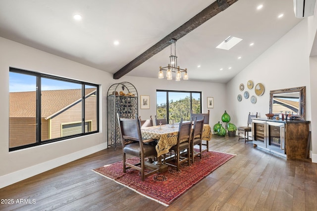 dining space featuring baseboards, a notable chandelier, wood finished floors, and beamed ceiling