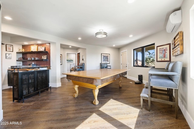 interior space featuring wet bar, dark wood-style flooring, a wall mounted air conditioner, and recessed lighting
