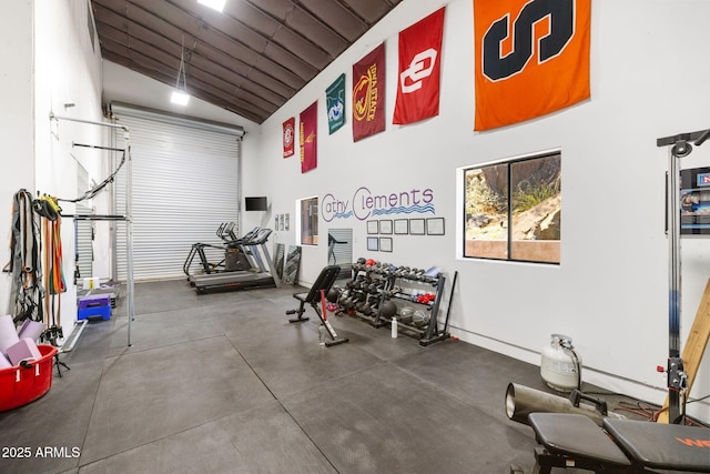 exercise area with high vaulted ceiling