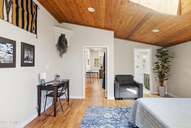bedroom featuring light wood finished floors, baseboards, vaulted ceiling, and wood ceiling