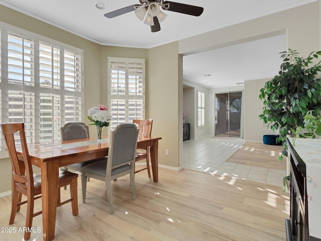 dining area with ceiling fan, light hardwood / wood-style flooring, and crown molding