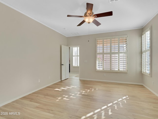 unfurnished room featuring light hardwood / wood-style flooring, ceiling fan, and ornamental molding