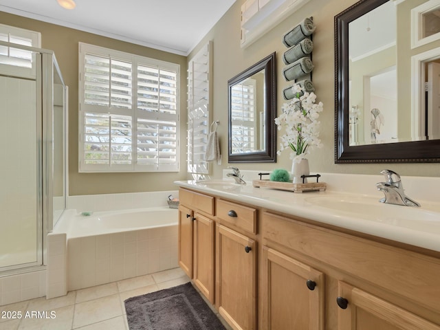 bathroom featuring vanity, independent shower and bath, and tile patterned flooring