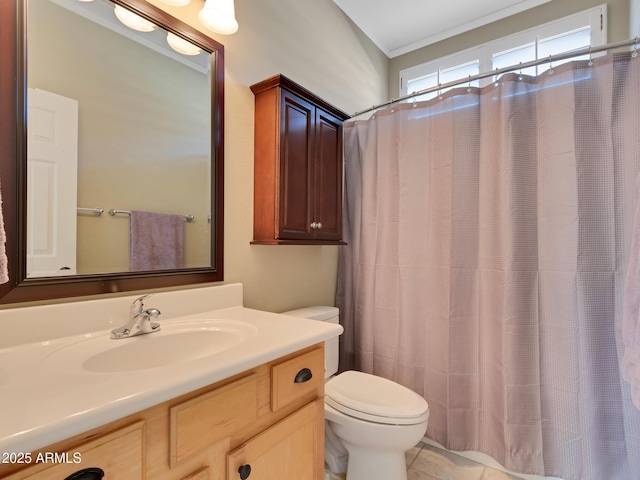 bathroom featuring toilet, vanity, crown molding, and a shower with curtain