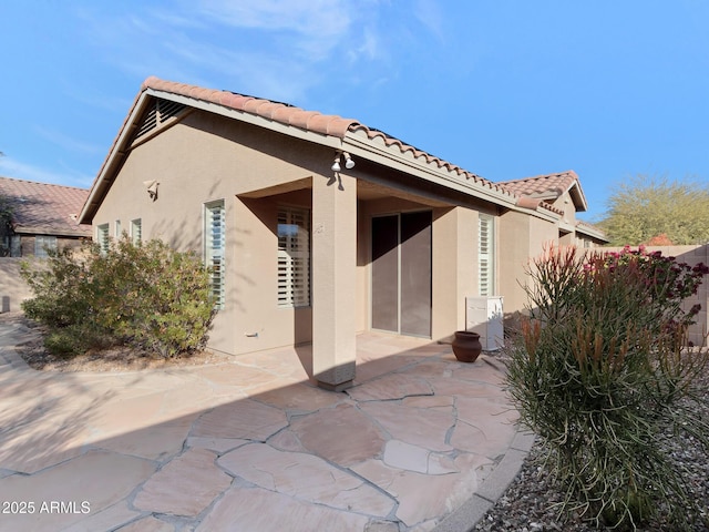 rear view of property with a patio