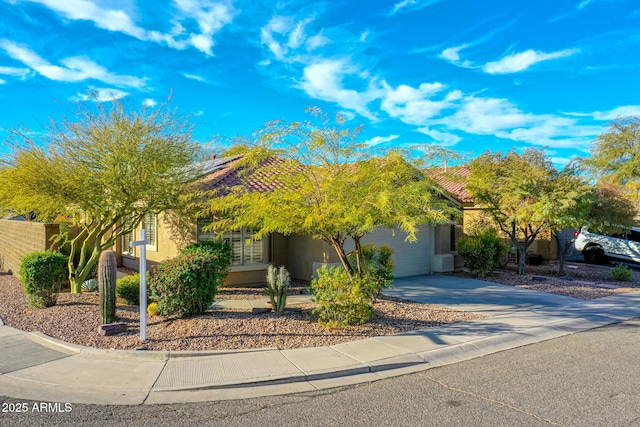 obstructed view of property featuring a garage