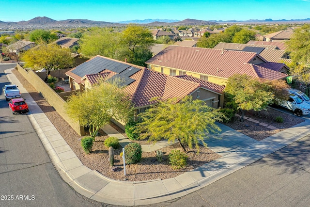 drone / aerial view featuring a mountain view