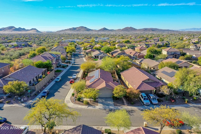 birds eye view of property featuring a mountain view