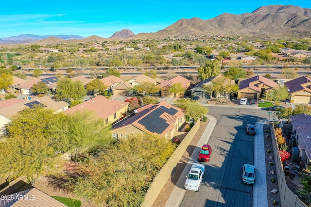 birds eye view of property featuring a mountain view