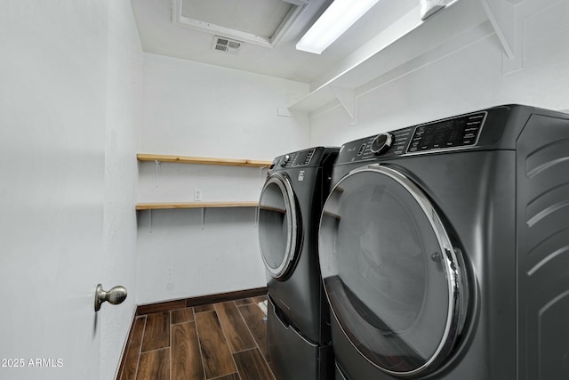 laundry area featuring washer and clothes dryer