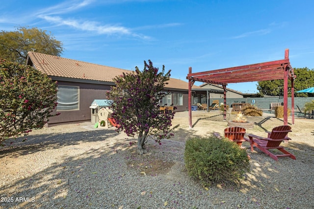 exterior space with a pergola and a patio