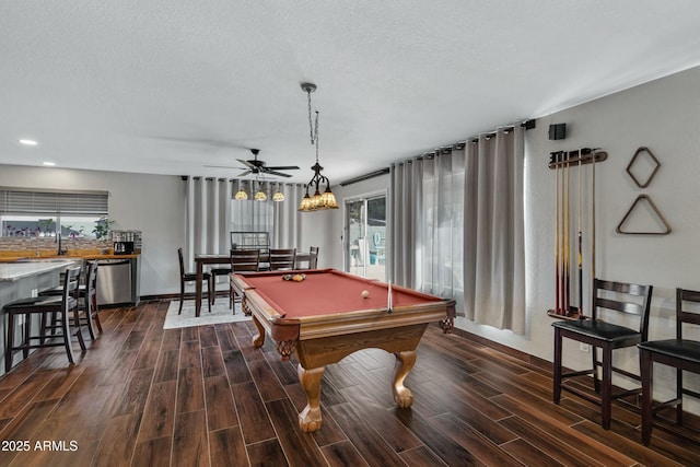 game room with ceiling fan, billiards, and a textured ceiling