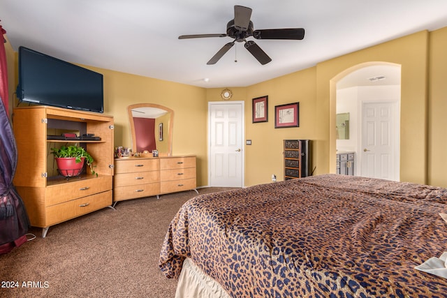 bedroom with ceiling fan and dark carpet