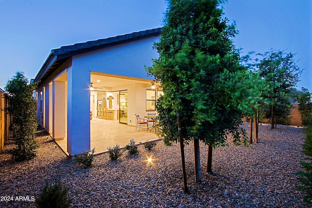 back of house with a patio area