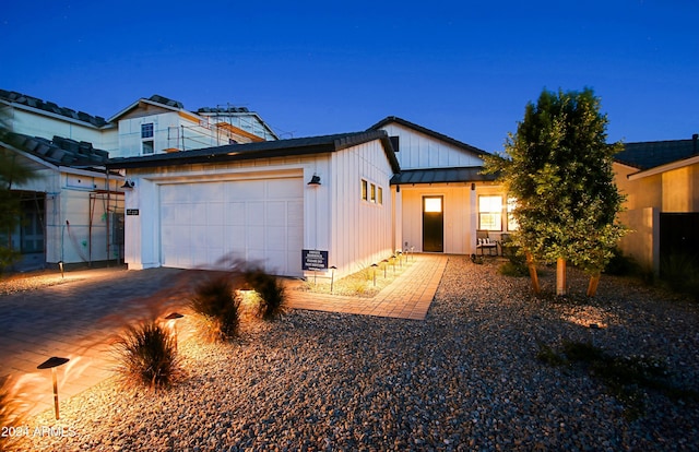 view of front of house with a garage