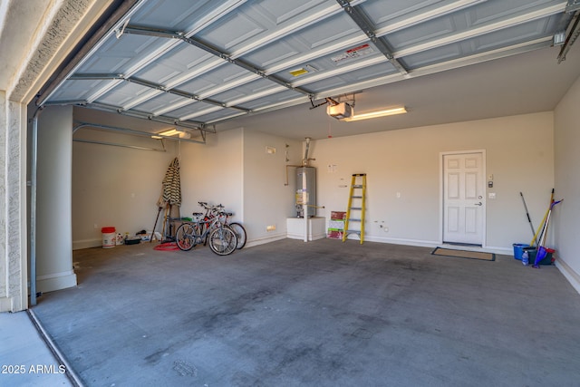 garage featuring a garage door opener and water heater