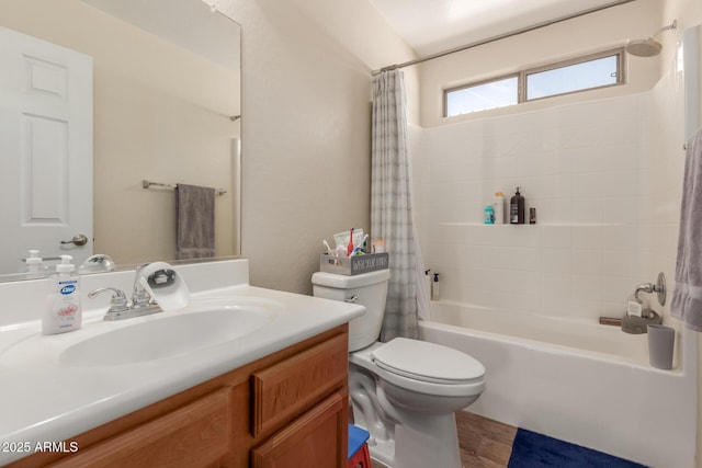 full bathroom with vanity, wood-type flooring, toilet, and shower / bath combo with shower curtain