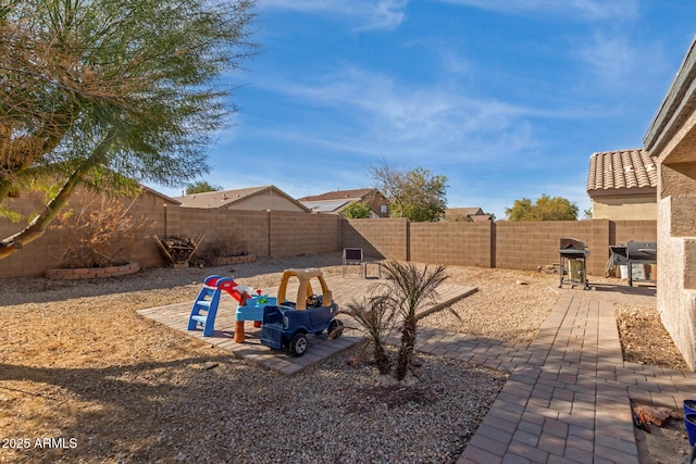 view of yard with a patio area