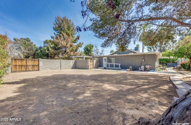 back of house featuring a patio area