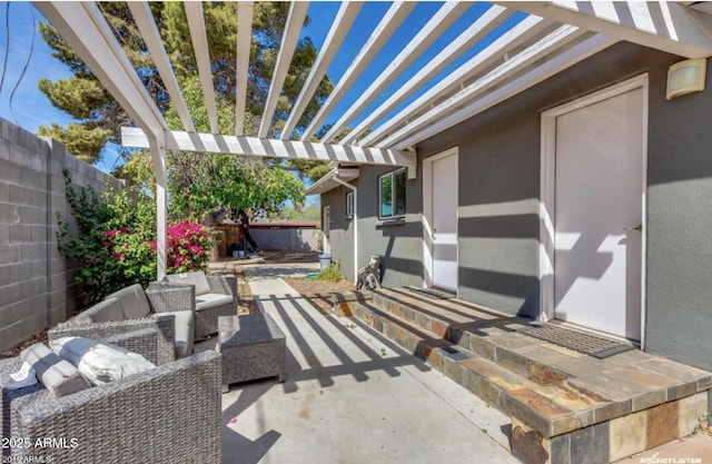 view of patio / terrace with an outdoor living space and a pergola