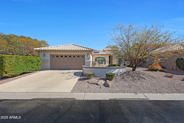 view of front of home with a garage