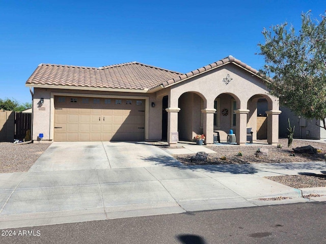 view of front of property featuring a garage