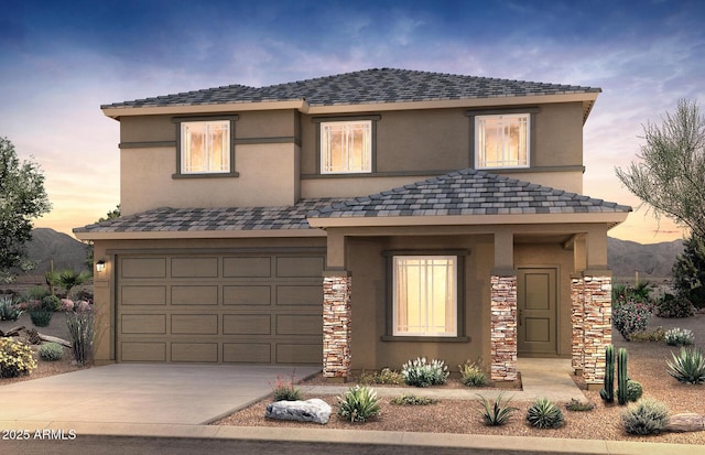 view of front of home with a garage