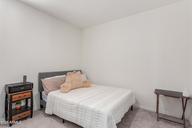 bedroom featuring light carpet