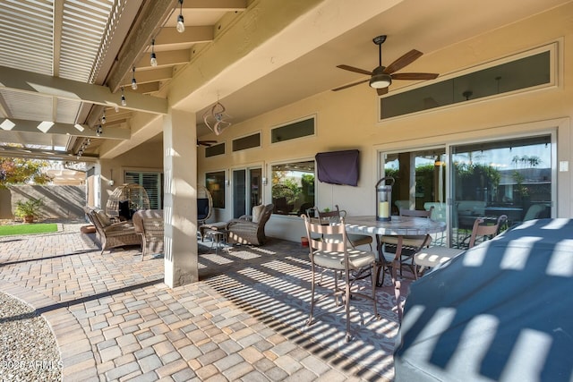 view of patio featuring an outdoor hangout area and ceiling fan