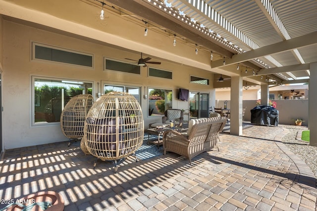 view of patio with ceiling fan, outdoor lounge area, a pergola, and area for grilling