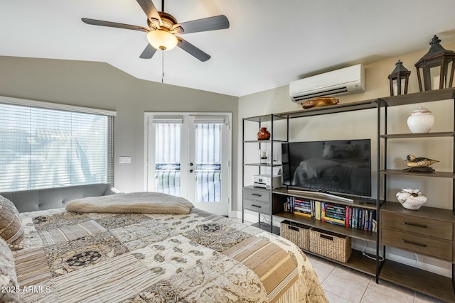 tiled bedroom with an AC wall unit, lofted ceiling, access to outside, ceiling fan, and french doors