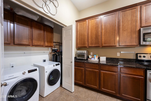 3330 S Gilbert Rd Unit 2090, Chandler, AZ 85286 - laundry room featuring a toaster, laundry area, light tile patterned floors, and washer and clothes dryer