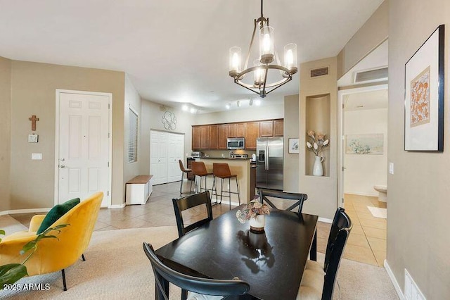 3330 S Gilbert Rd Unit 2090, Chandler, AZ 85286 - dining room featuring light tile patterned floors, visible vents, baseboards, and an inviting chandelier