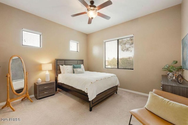 3330 S Gilbert Rd Unit 2090, Chandler, AZ 85286 - bedroom with light colored carpet, baseboards, and ceiling fan