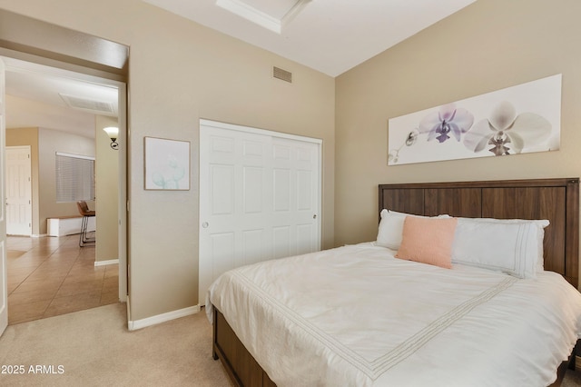 3330 S Gilbert Rd Unit 2090, Chandler, AZ 85286 - bedroom featuring light tile patterned flooring, light colored carpet, visible vents, and baseboards