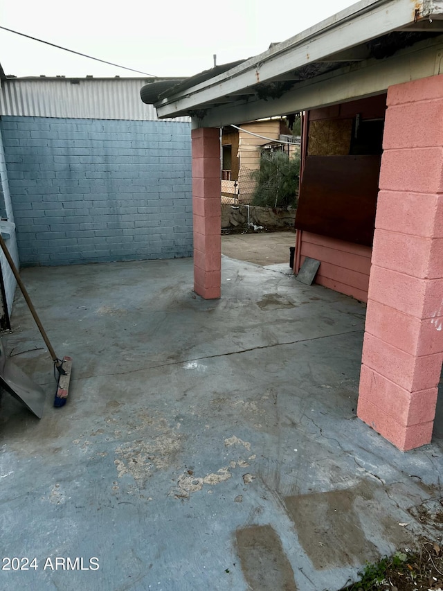 view of patio featuring fence