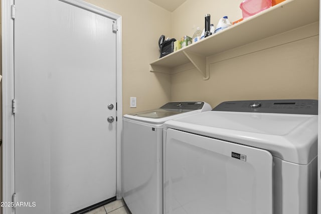 2111 N 77th Gln, Phoenix, AZ 85035 - washroom with independent washer and dryer and light tile patterned floors