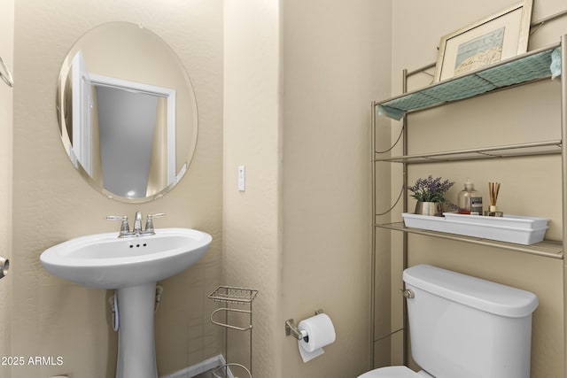 2111 N 77th Gln, Phoenix, AZ 85035 - half bath featuring toilet