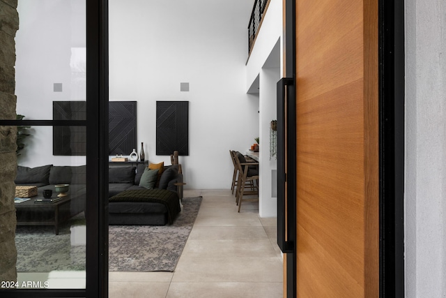 interior space with light tile patterned floors