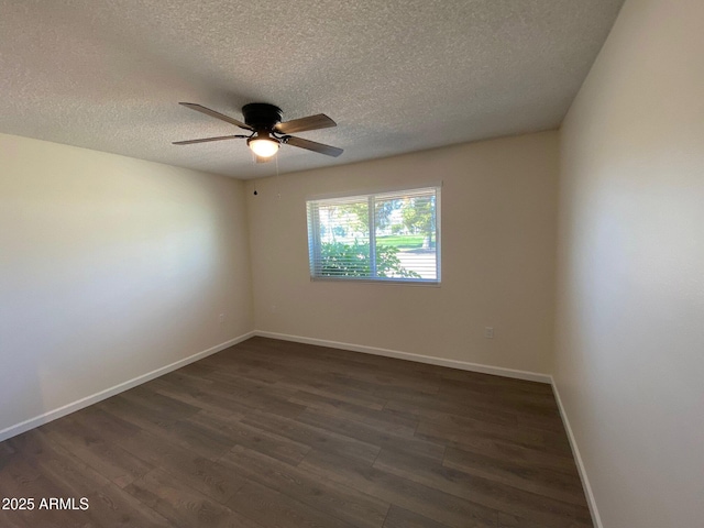 unfurnished room featuring dark hardwood / wood-style flooring, a textured ceiling, and ceiling fan