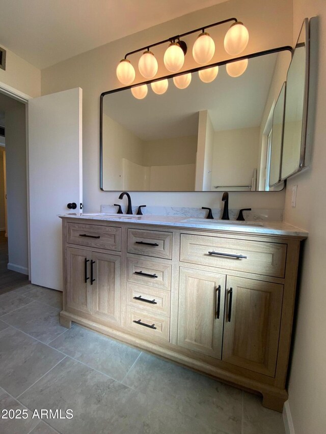 bathroom featuring vanity and tile patterned floors