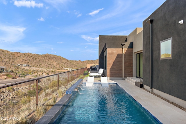 14108 E Harmony Ln, Fountain Hills, AZ 85268 - view of pool with a fenced in pool, a mountain view, fence, and a patio