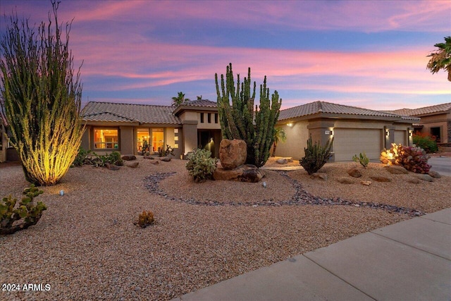 view of front of property featuring a garage